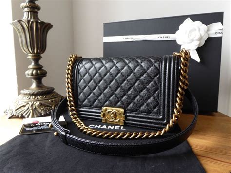 chanel boy bag medium black and gold|Chanel boy bag old medium.